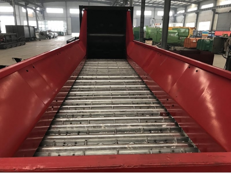 Transportador de placas metálicas