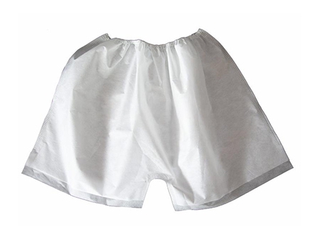 Máquina para fabricação de shorts de não tecido